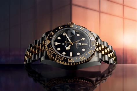 gold and black gmt rolex